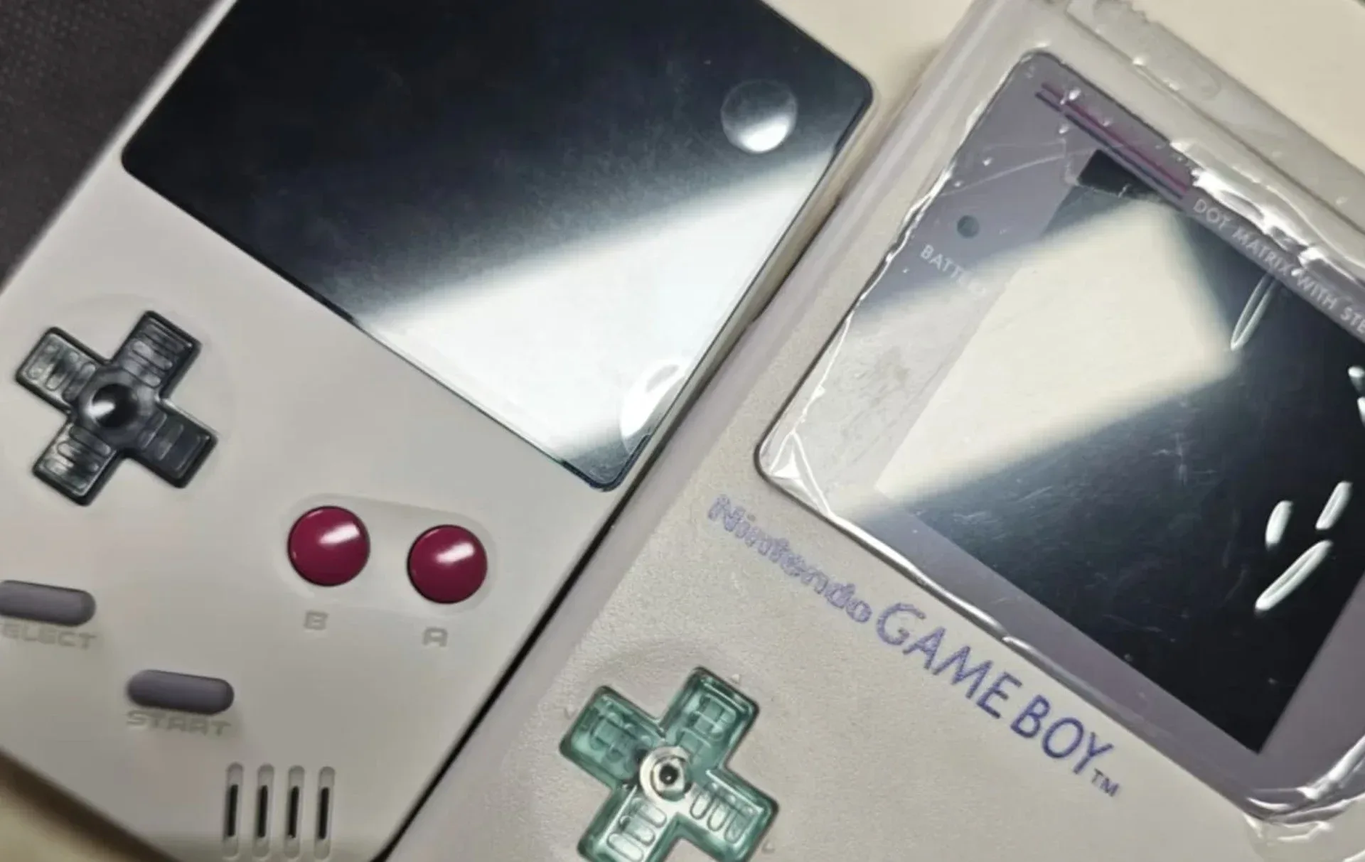 Close view of the compact handheld’s Game Boy-style D-pad and screen