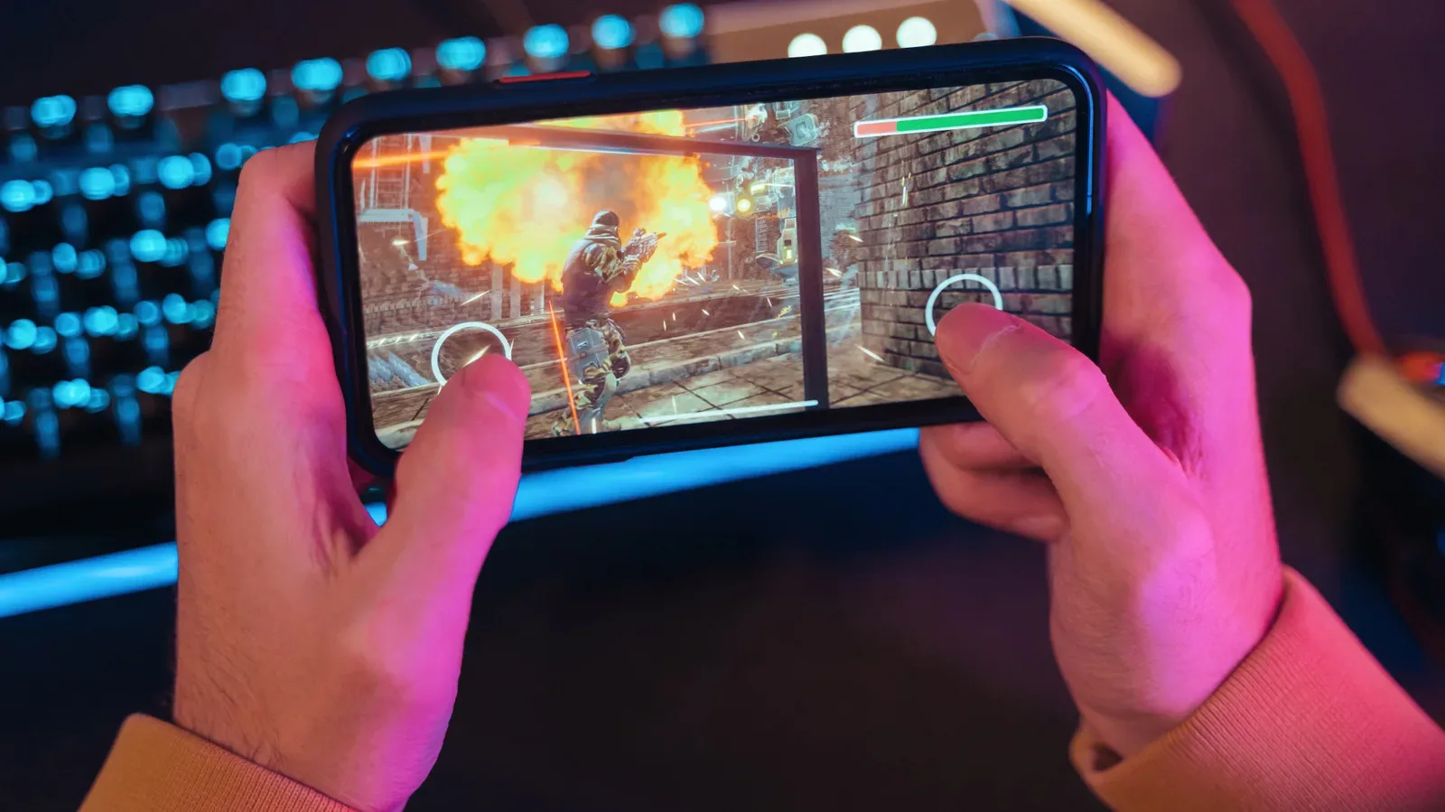 An Android phone displaying a fast-paced mobile game