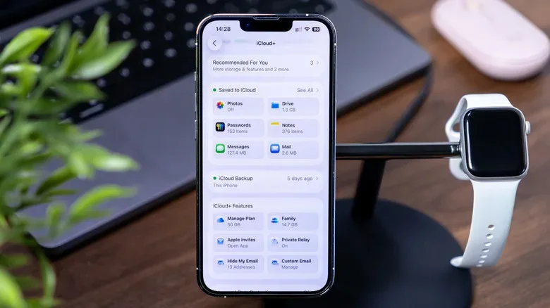 An iPhone Recovery Mode screen connected to a computer during an iOS restore