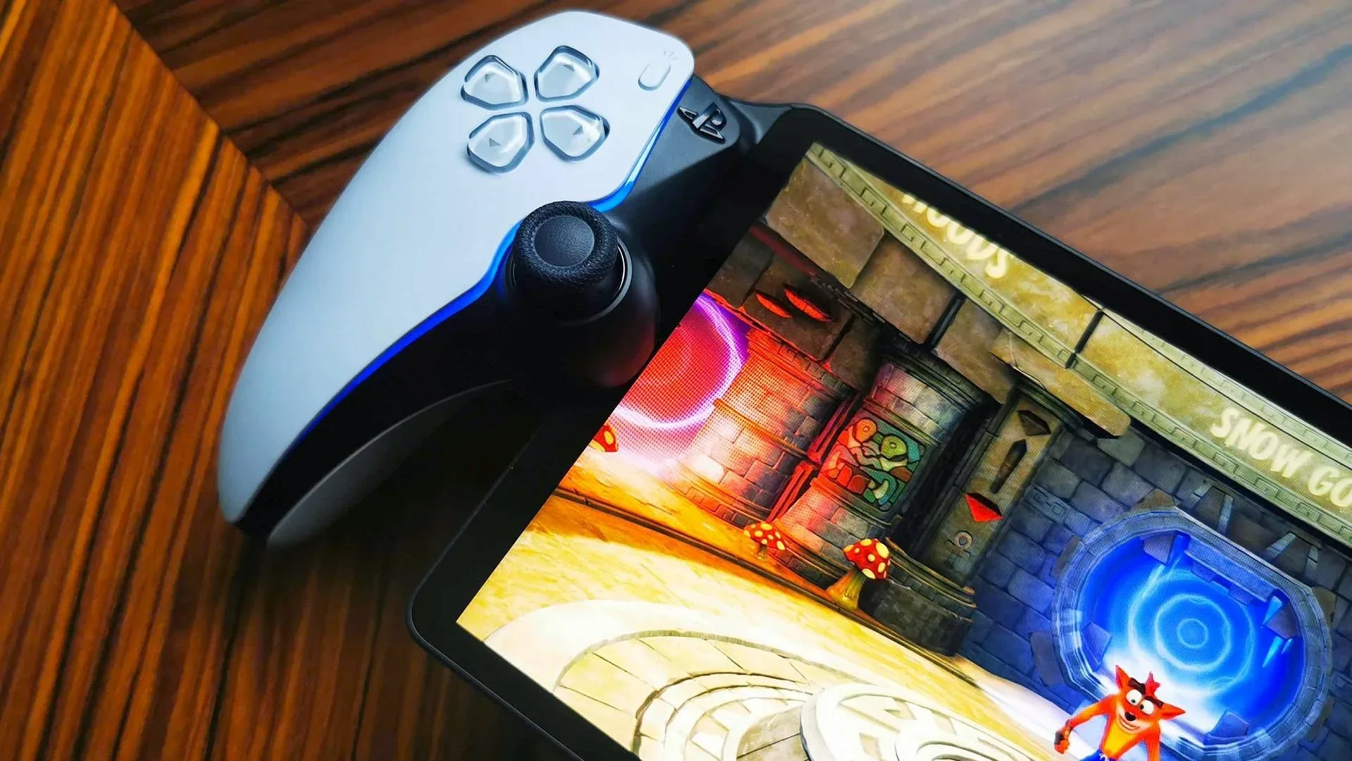 Shawn Layden discusses the challenge of supporting PlayStation home console and handheld hardware