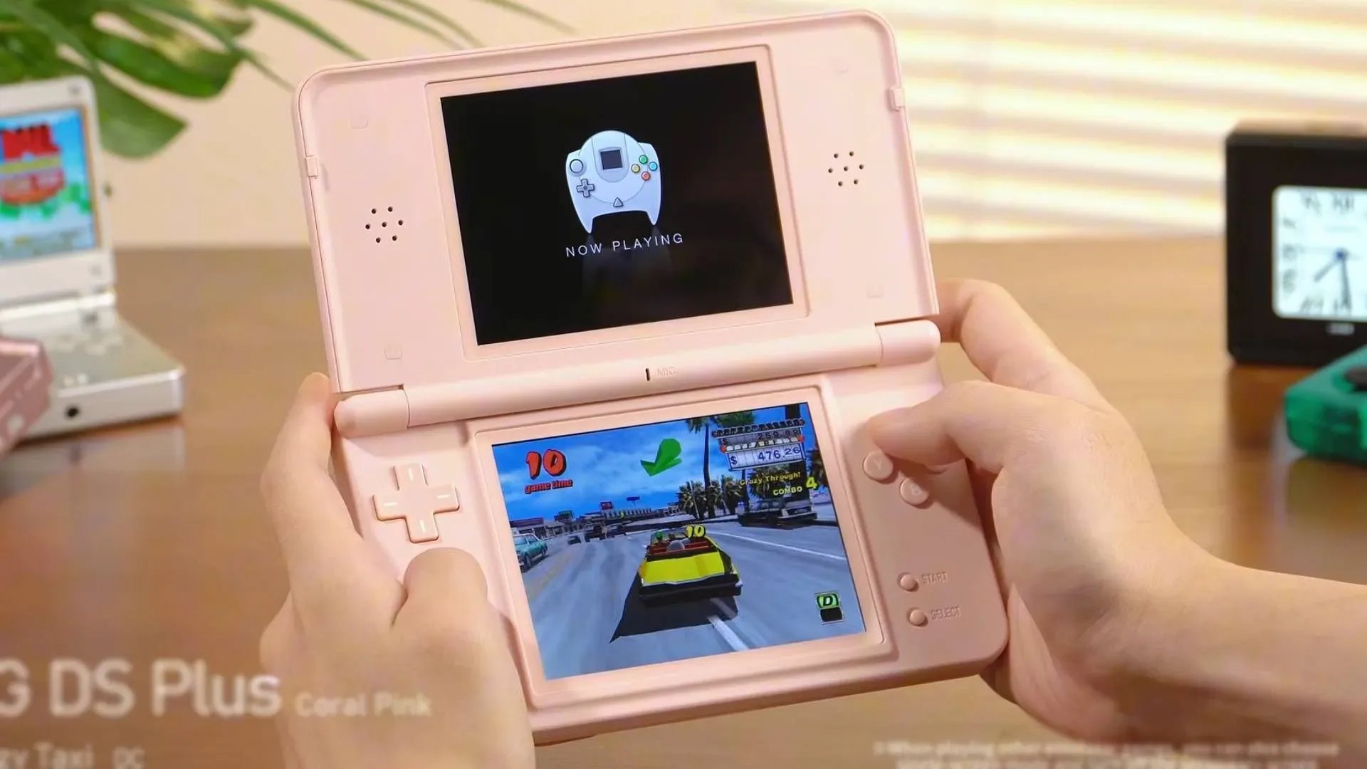 Anbernic RG DS Plus clamshell handheld with dual displays and integrated stylus