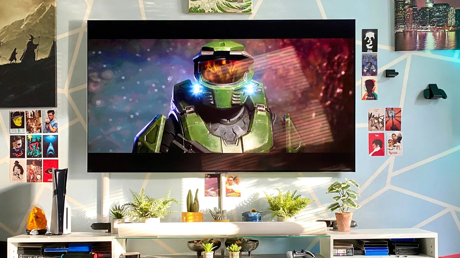 A player seated at an appropriate distance from a large television showing a game