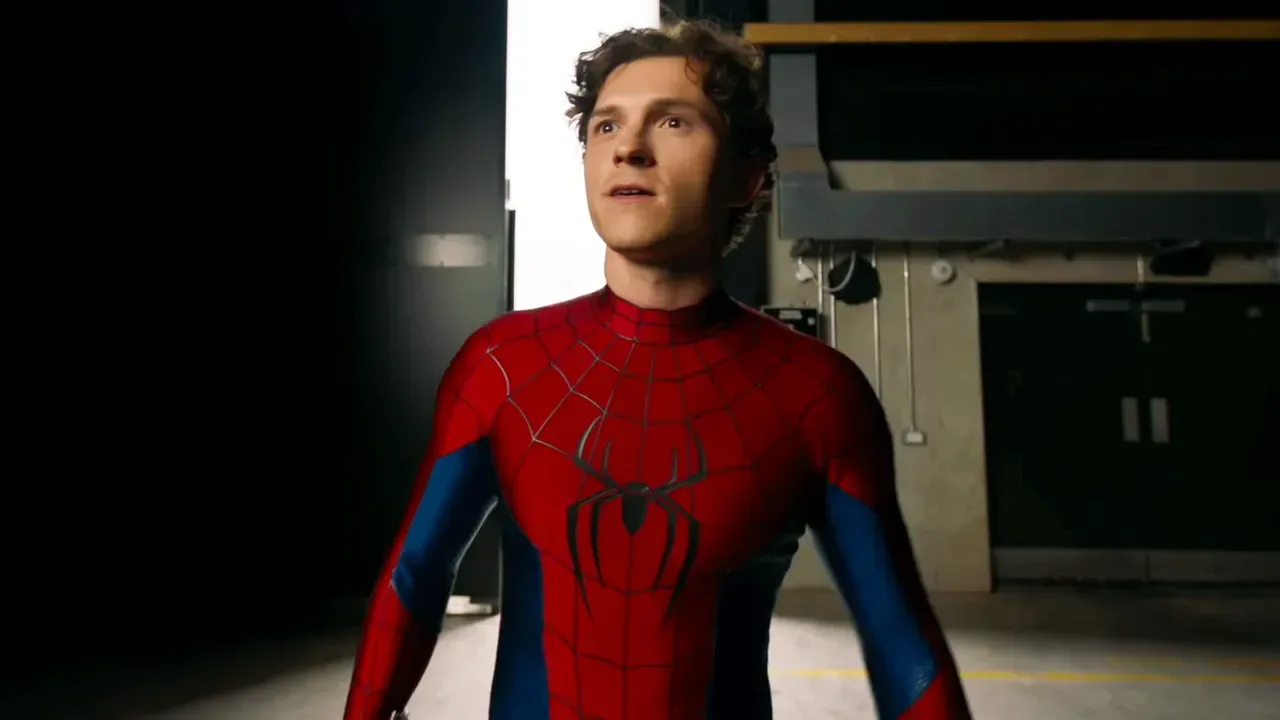 Peter Parker standing alone in a city scene