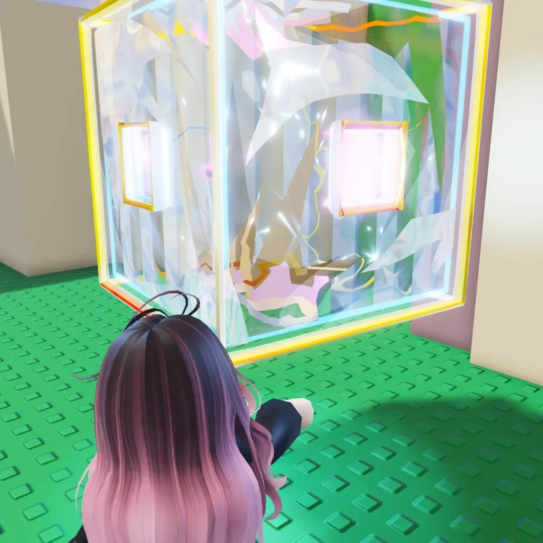 A player touches a large 3D Roblox Tilt icon in the Roblox The Hunt 20 hub.