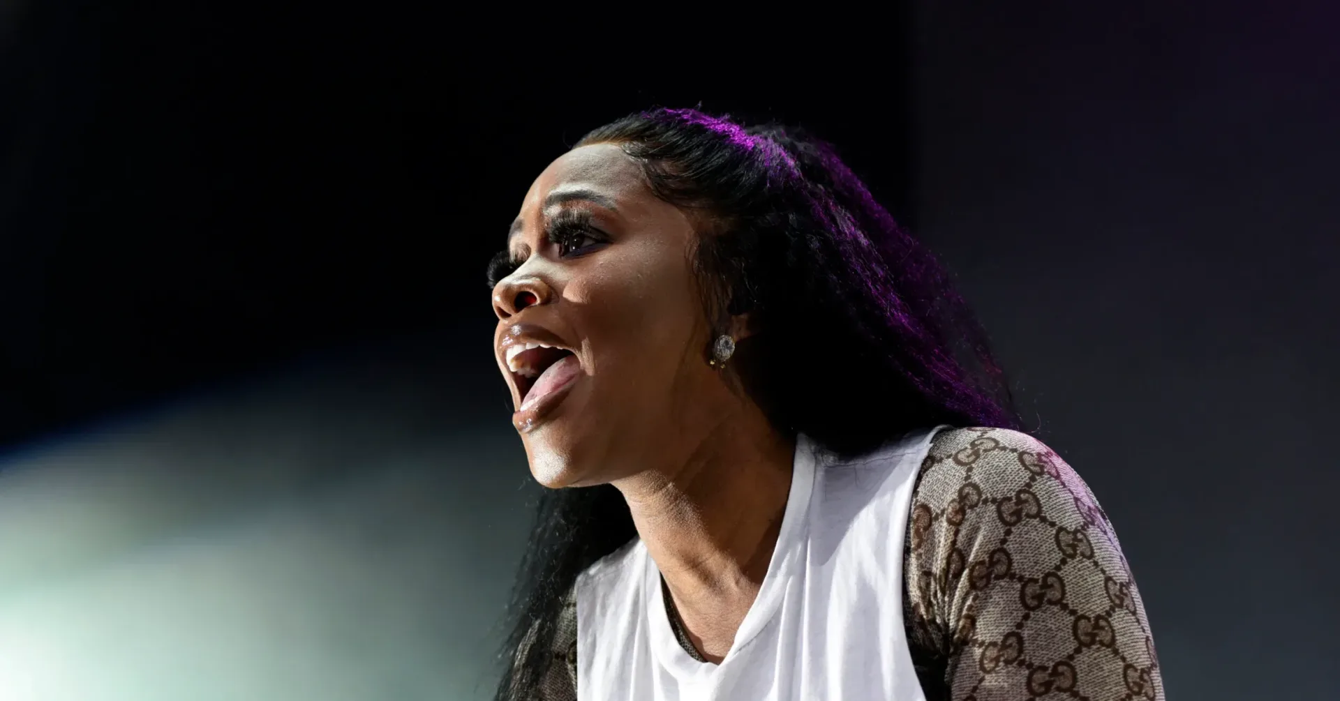 Remy Ma at the Alimony EP release event wearing an all-black outfit with ‘Jezebel’ lettering