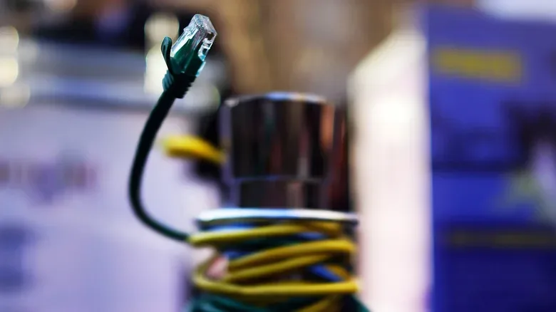 Long home Ethernet cable route with a network switch midpoint