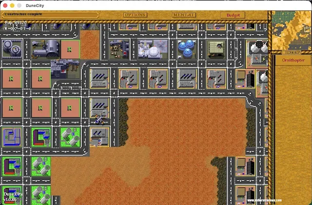 DuneCity settlement on Arrakis with roads and zoned districts