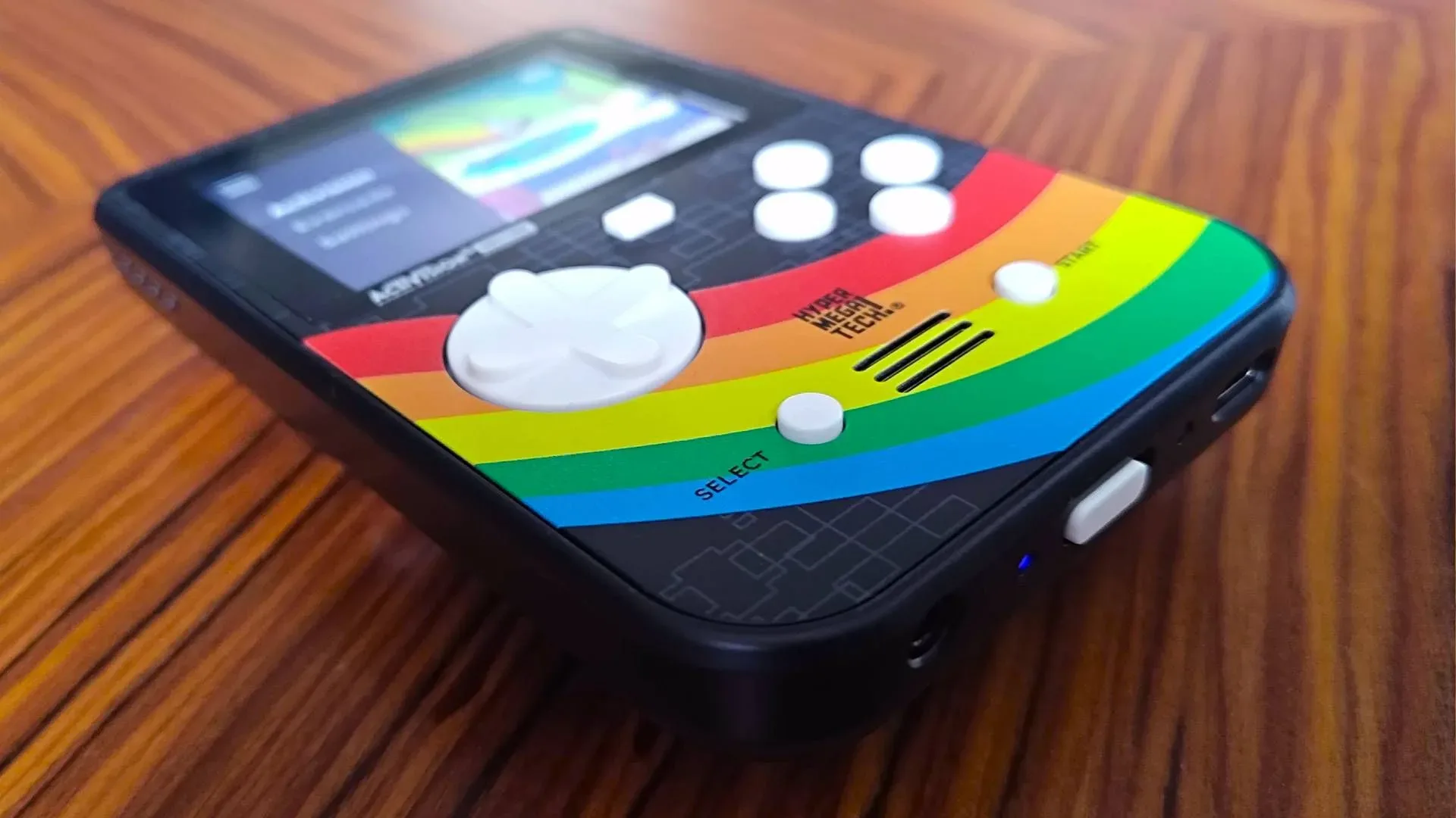Activision Edition Super Pocket handheld with its retro rainbow design