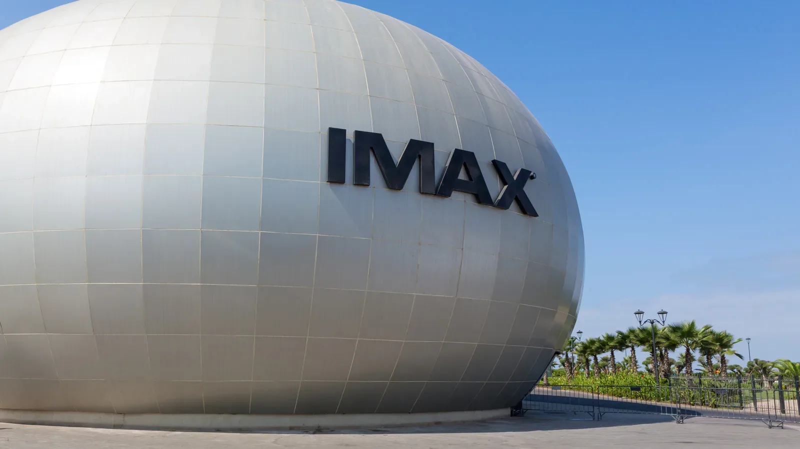 An IMAX Dome theater with a curved ceiling-spanning projection screen