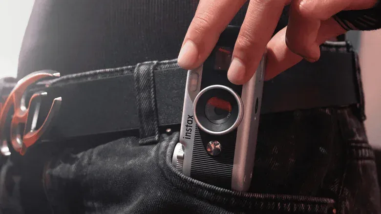 Instax Pal 2 controls including its filter dial and frame-selection lever