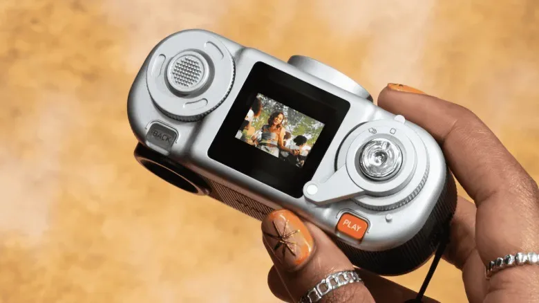 Fujifilm Instax Pal 2 connected to a smartphone through USB-C