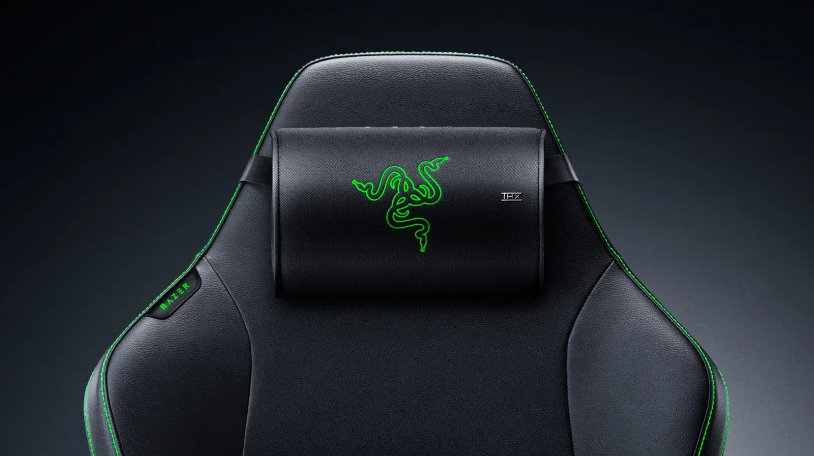 Razer Clio X wireless speaker head cushion attached to a gaming chair