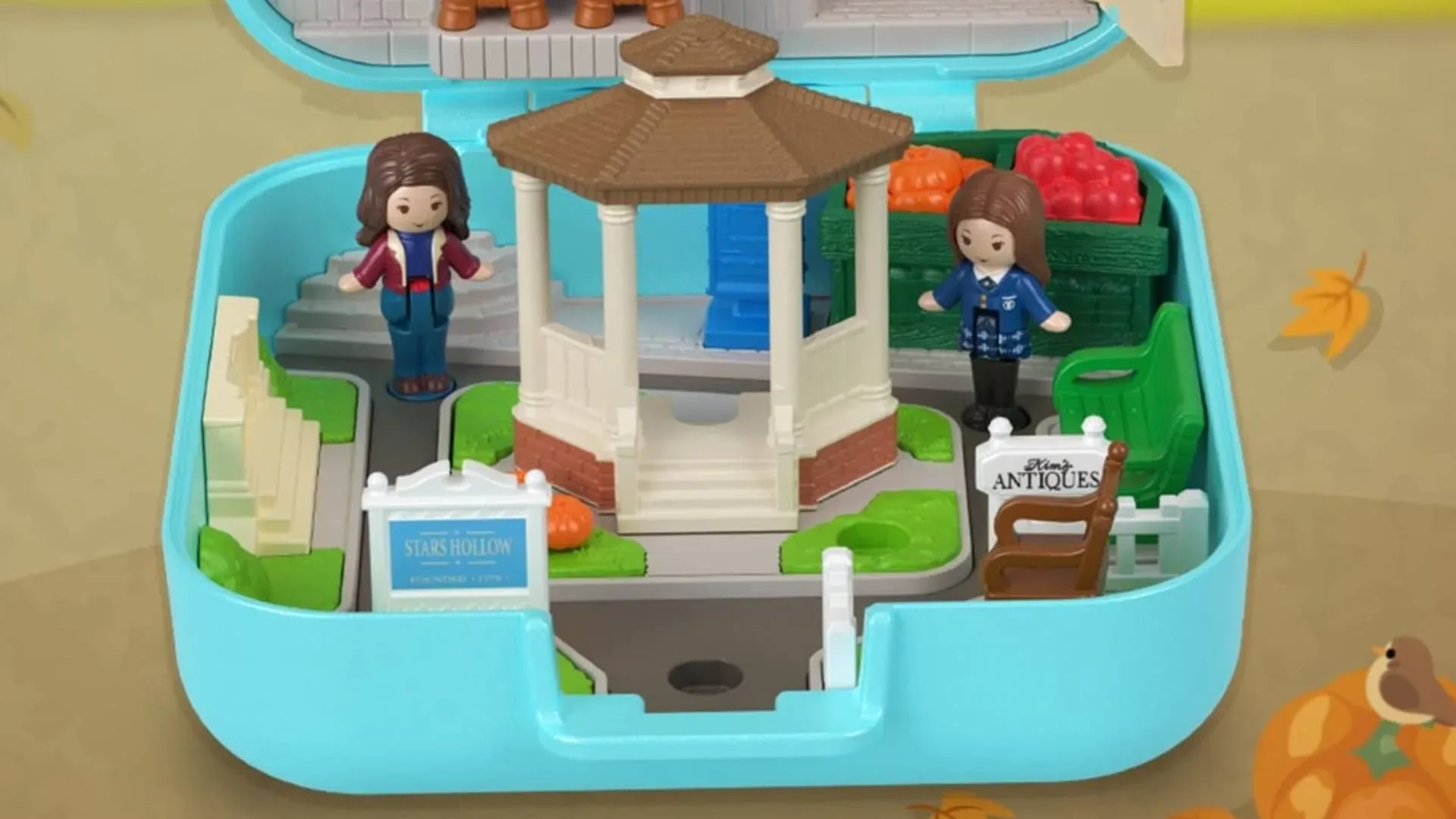 Gilmore Girls Polly Pocket compact opened to reveal miniature Stars Hollow locations