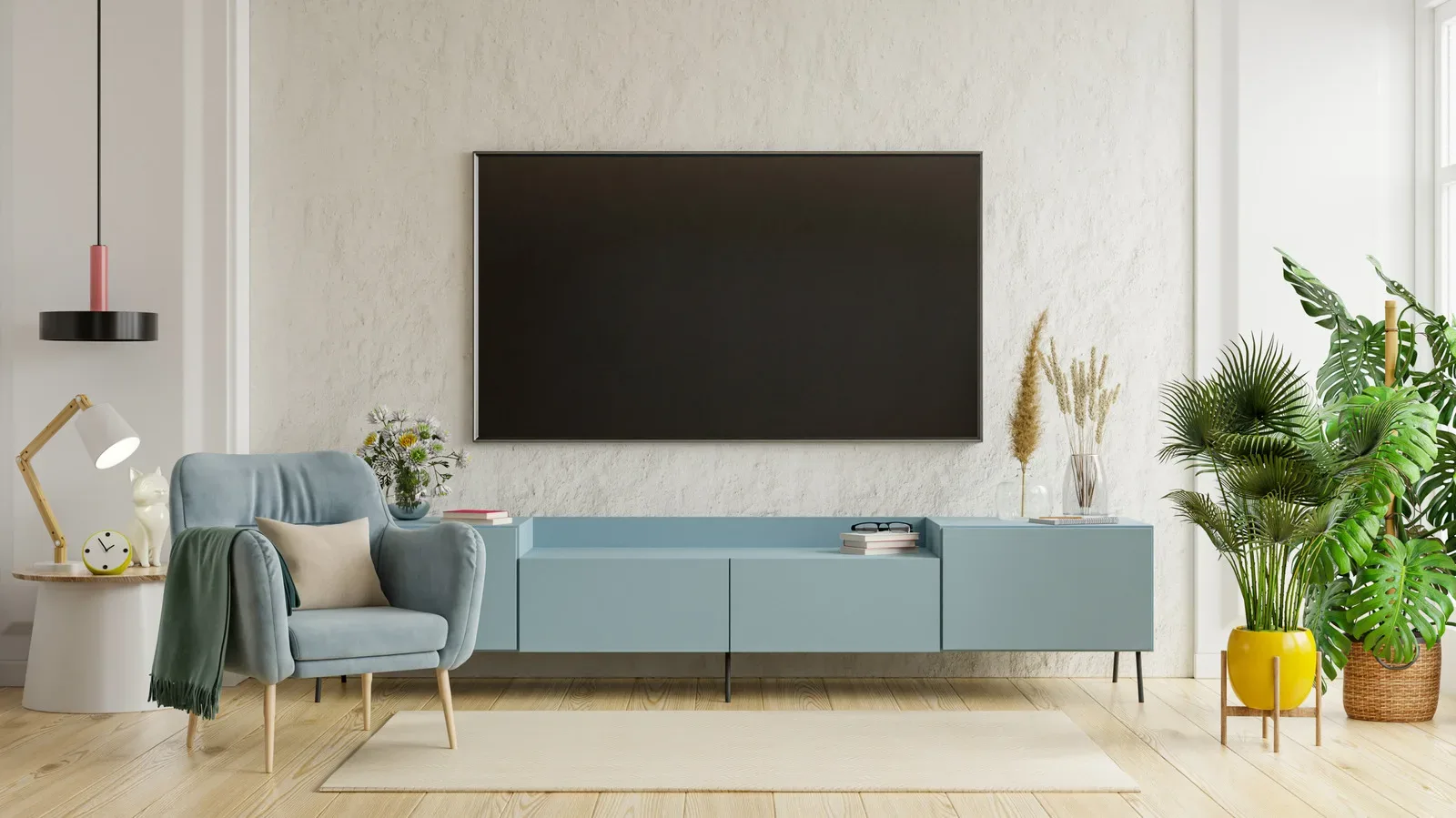 OLED and LED smart TVs showing a dark HDR movie scene side by side