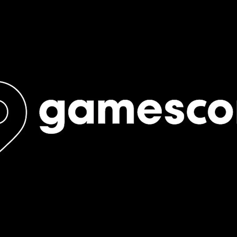 A games convention floor with indie developer booths and demo stations