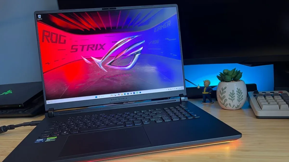 Asus ROG Strix Scar 18 gaming laptop on a wooden desk
