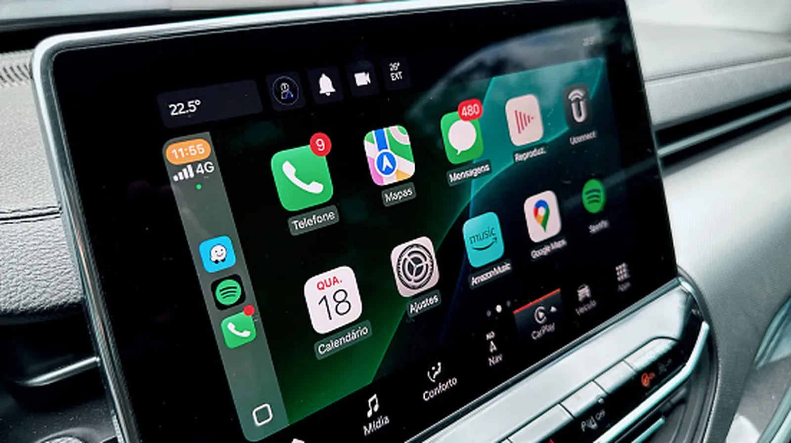 Ottocast wireless Apple CarPlay adapter connected to a vehicle USB port