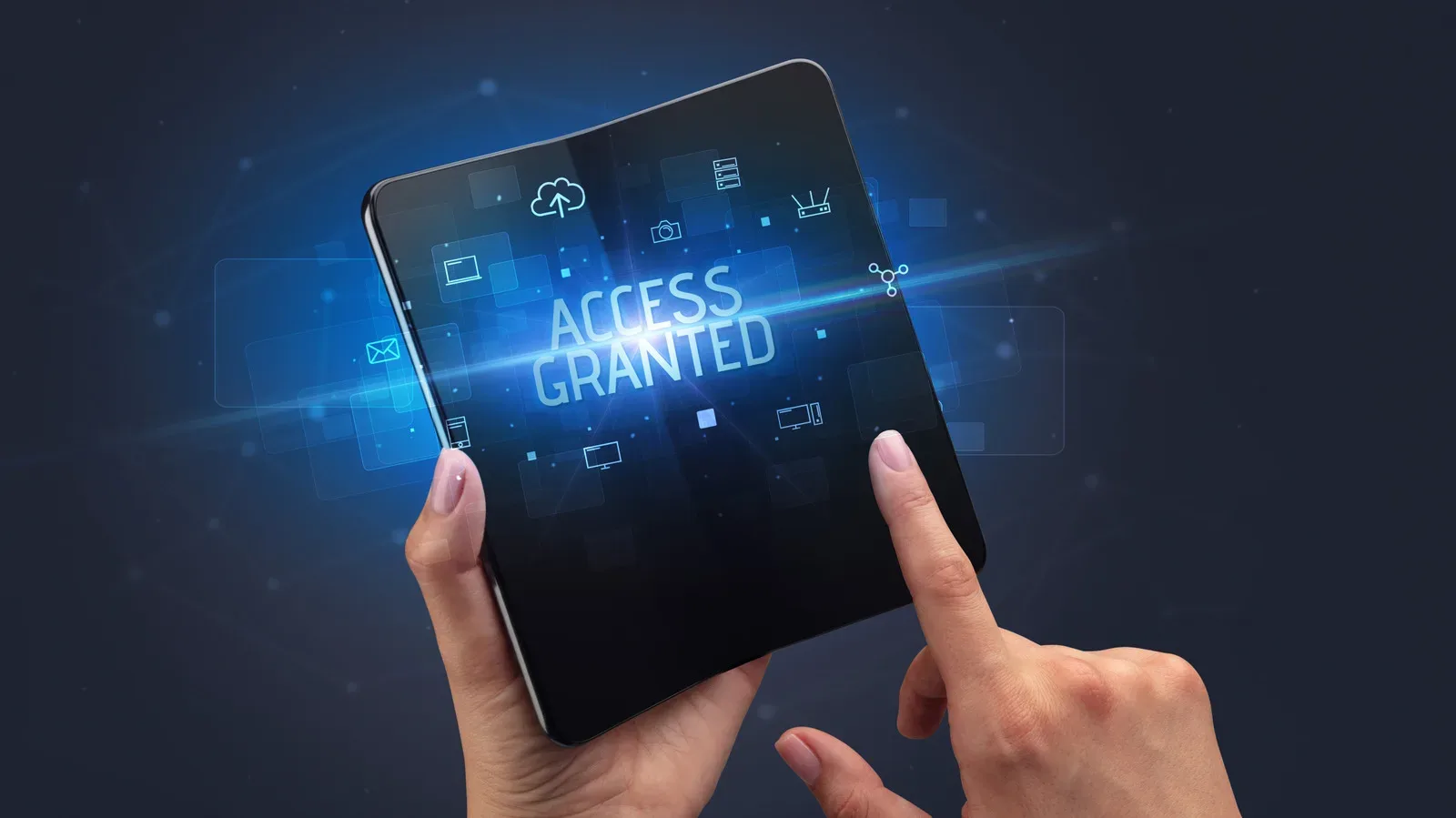 A book-style foldable phone opened beside a compact tablet