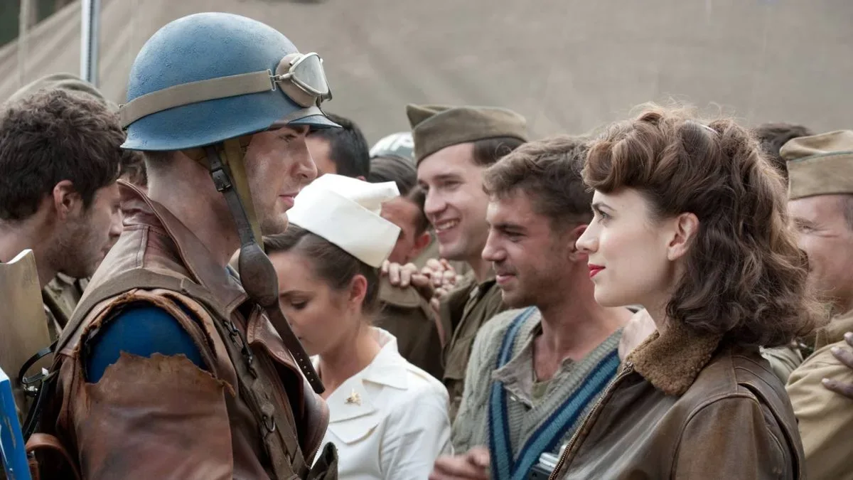 Chris Evans as Steve Rogers and Hayley Atwell as Peggy Carter in Captain America: The First Avenger