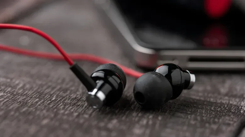Mobile gaming setup using wired headphones and a USB-C audio adapter