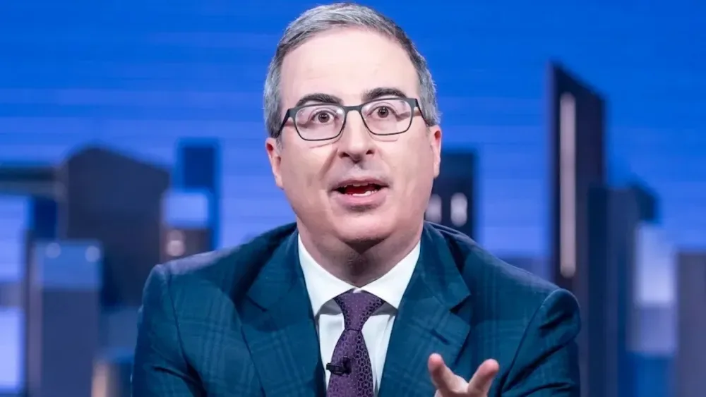 John Oliver Jokes That David Ellison Has a ‘Business Daddy’ as Warner Bros. Discovery Deal Looms