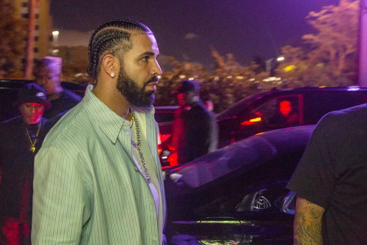 Drake in the FOMO trailer on a bright green yacht