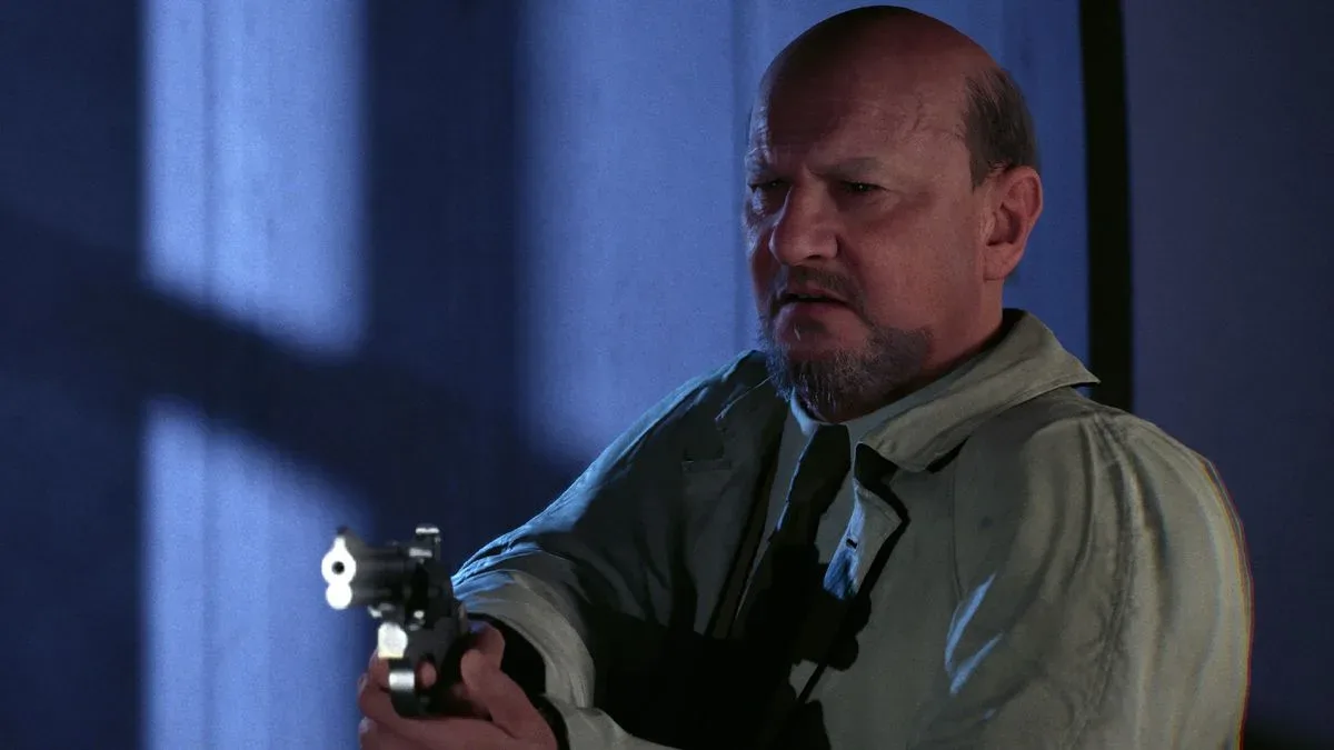 Sam Loomis aims a gun in Halloween the Game.