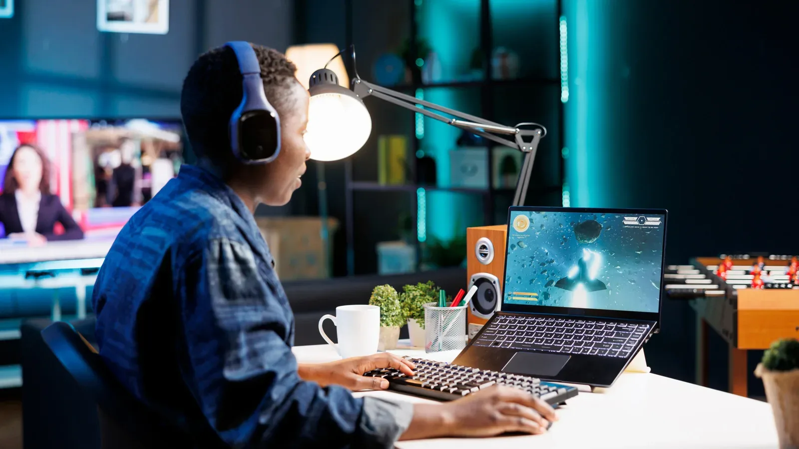 Gaming laptop on a desk with clear ventilation around its cooling vents
