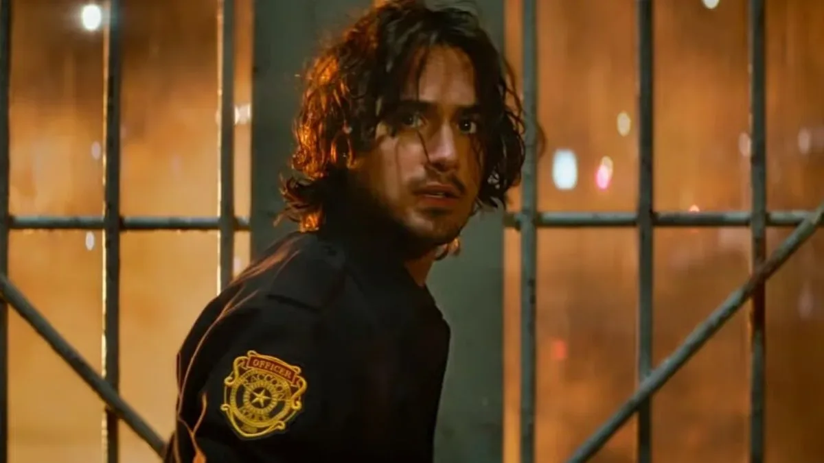 Avan Jogia as Leon Kennedy looking scared during the horror movie Welcome to Raccoon City