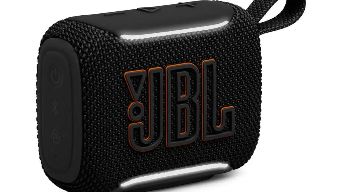 JBL Go 5 portable Bluetooth speaker shown in a compact outdoor-ready setup