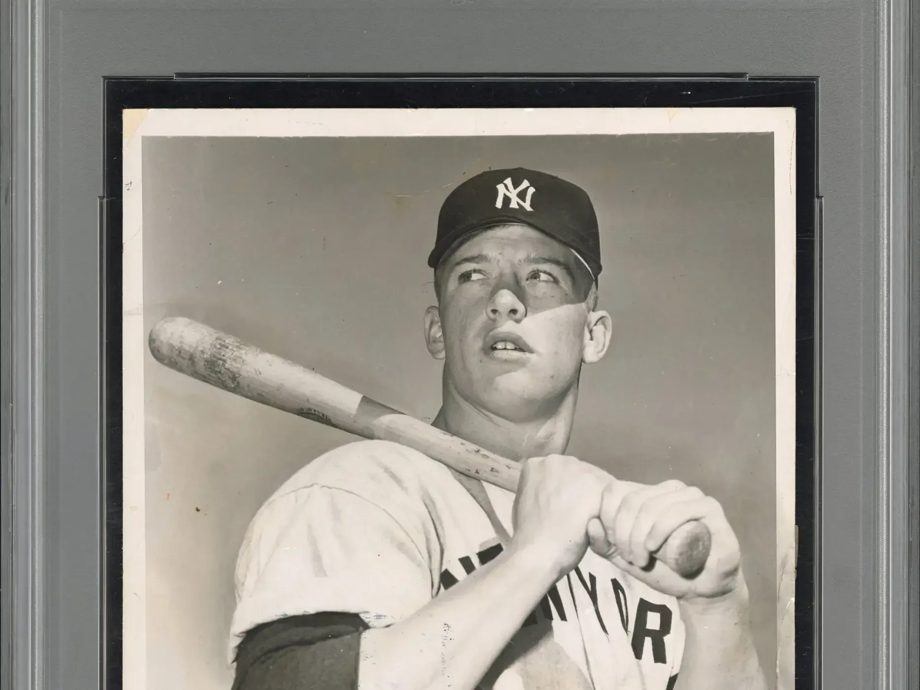 Reverse of the Mickey Mantle Type I press photograph showing news-service and publication markings