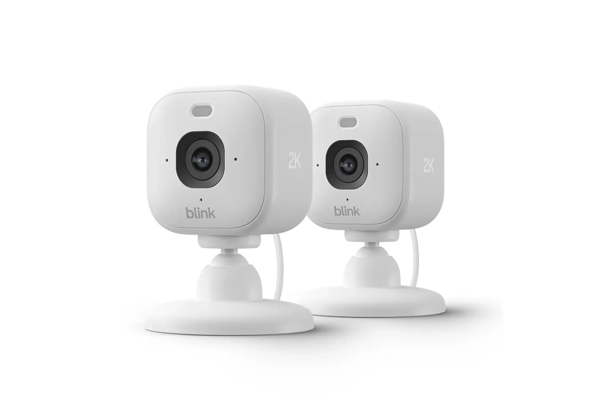 Blink Mini 2K+ indoor security camera positioned near a wall outlet