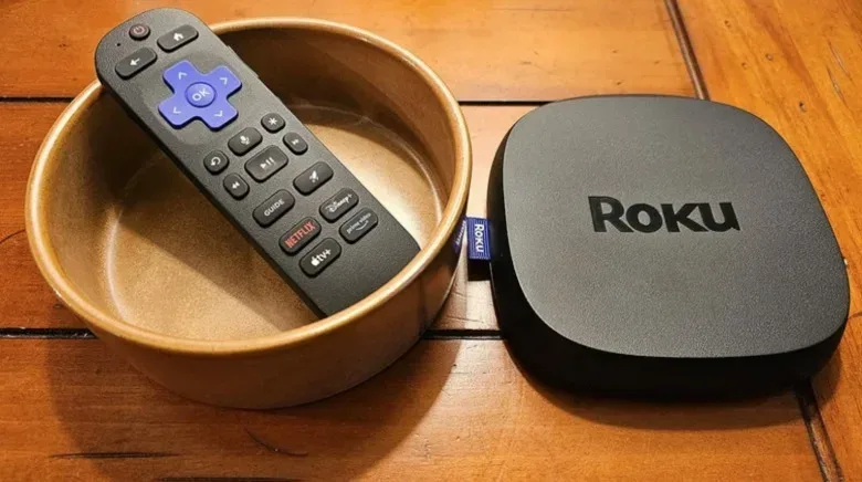 A compact streaming device packed for travel