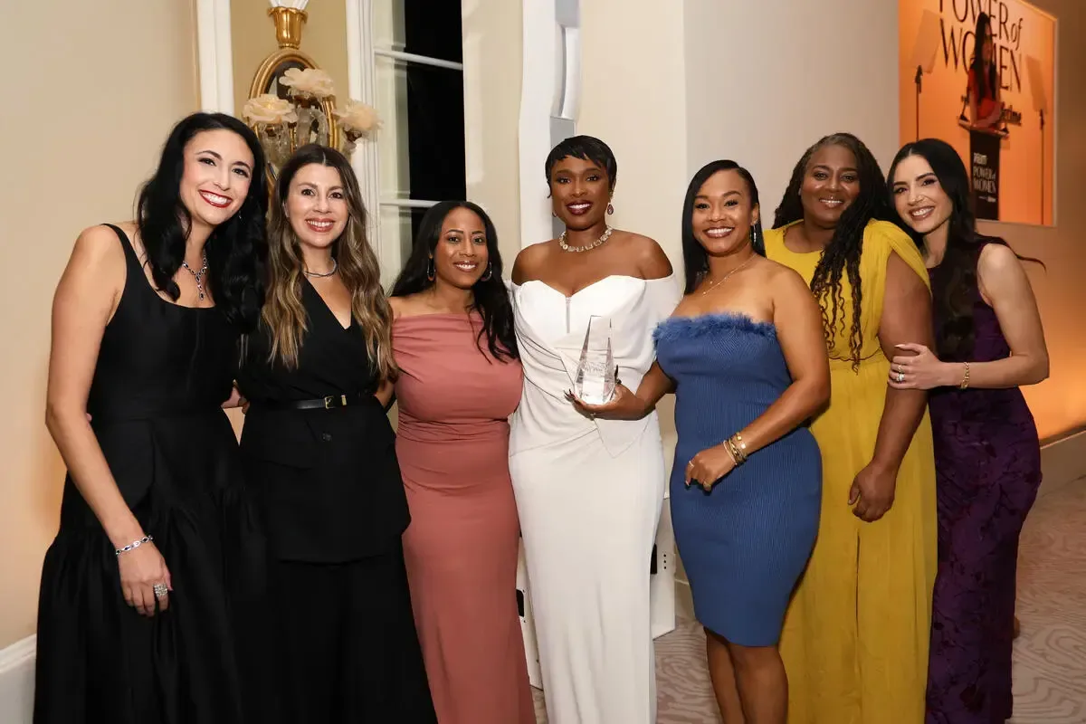 Jennifer Hudson accepts a Changemaker Award alongside members of The Jennifer Hudson Show team
