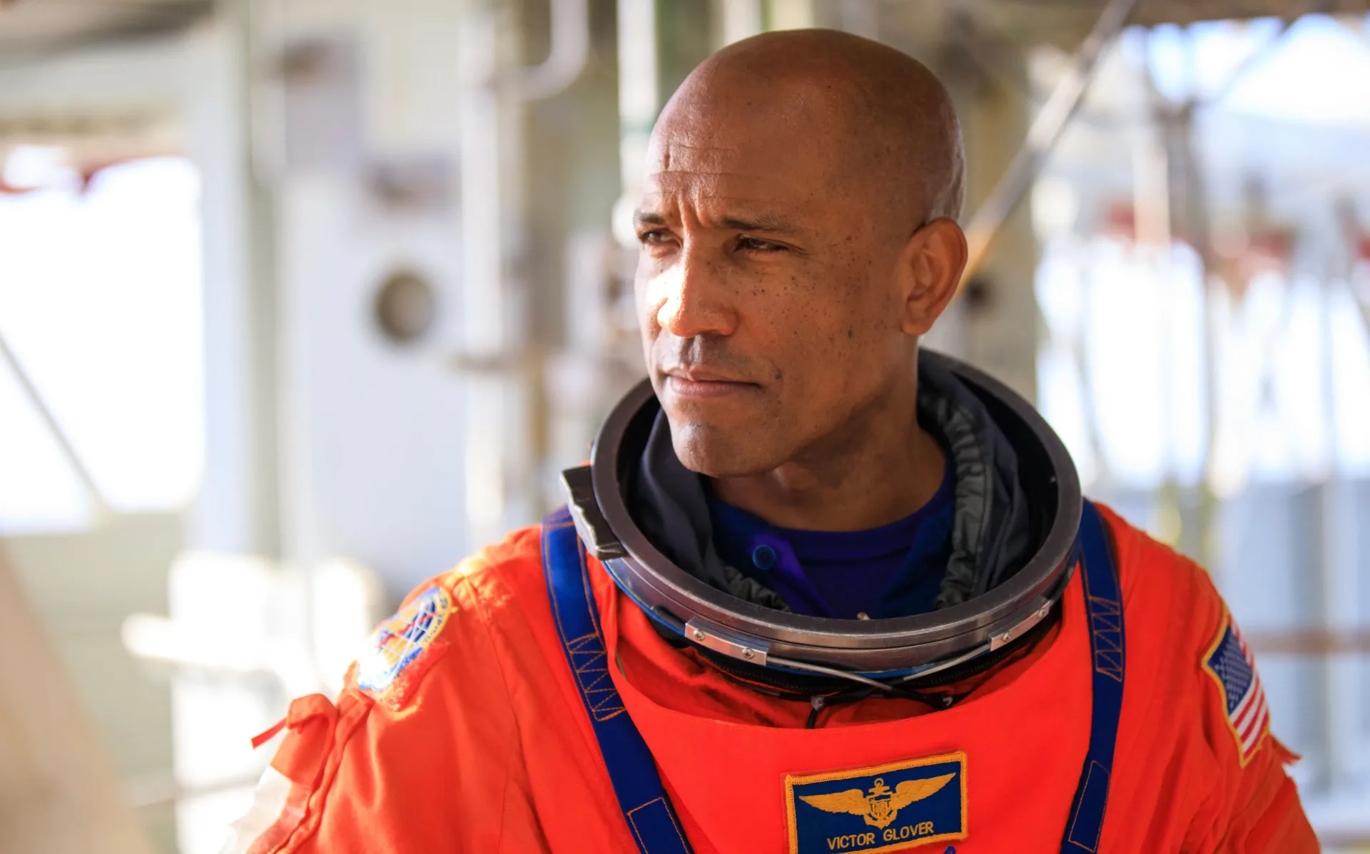 Astronaut Victor Glover in a NASA flight suit