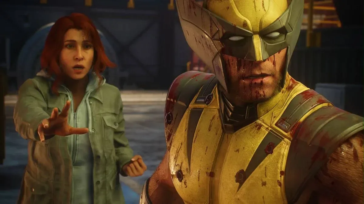 Marvel's Wolverine - Jean with an arm outstretched looking surprised while Wolverine looks on