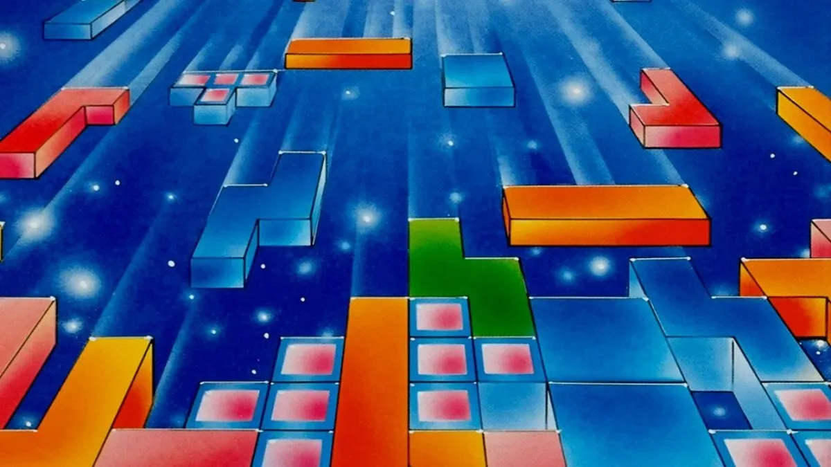 A conceptual falling-block puzzle grid representing the Build the Wall game controversy