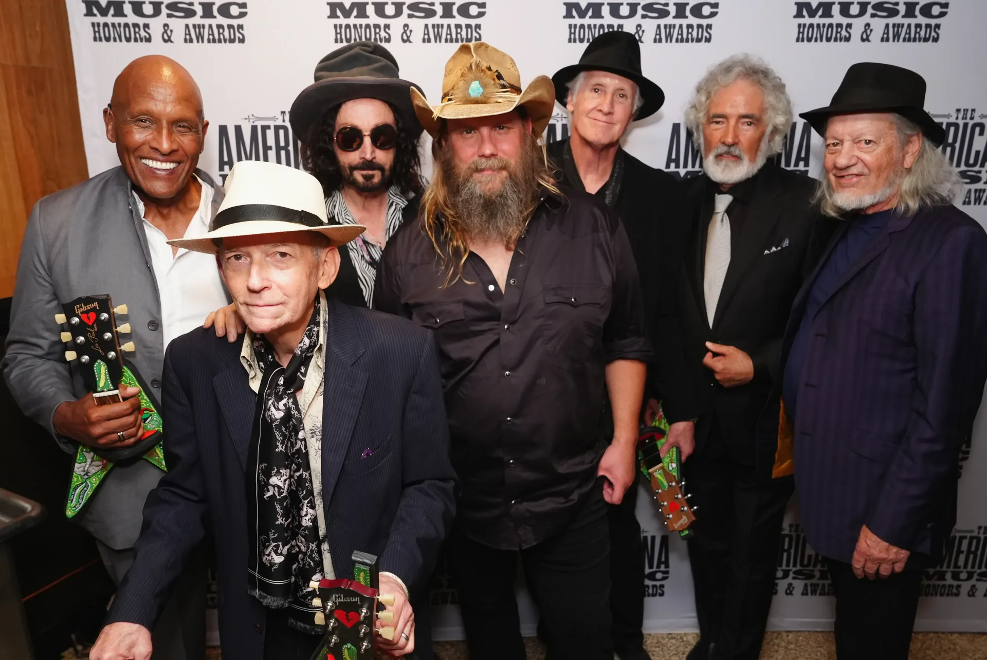 Chris Stapleton performs with Mike Campbell and Ron Blair during the Heartbreakers reunion at Nashville's Ryman Auditorium