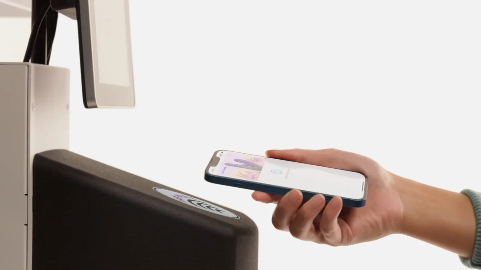Apple Wallet displayed on an iPhone with payment cards and digital passes