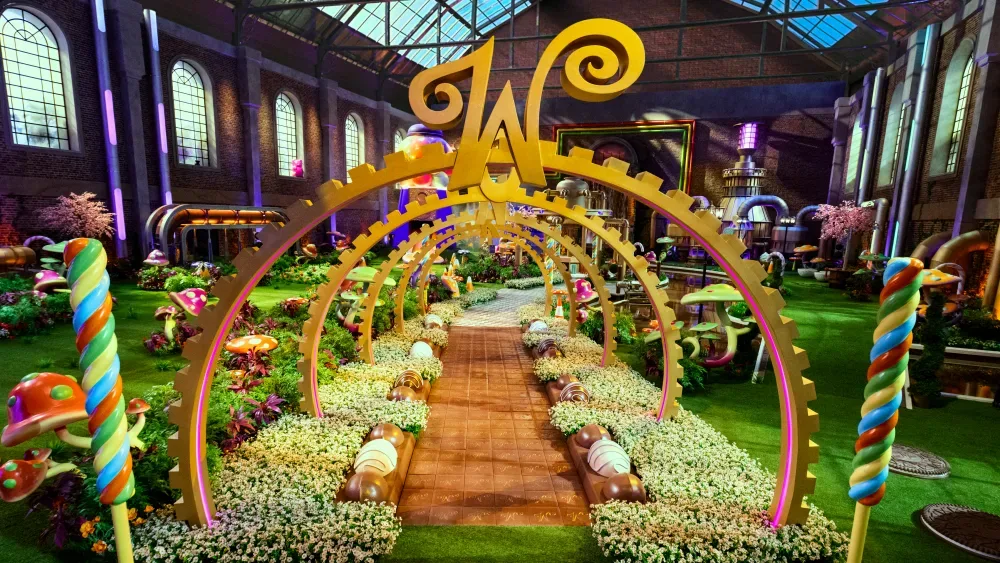 A stylized golden ticket representing Netflix’s Wonka competition series
