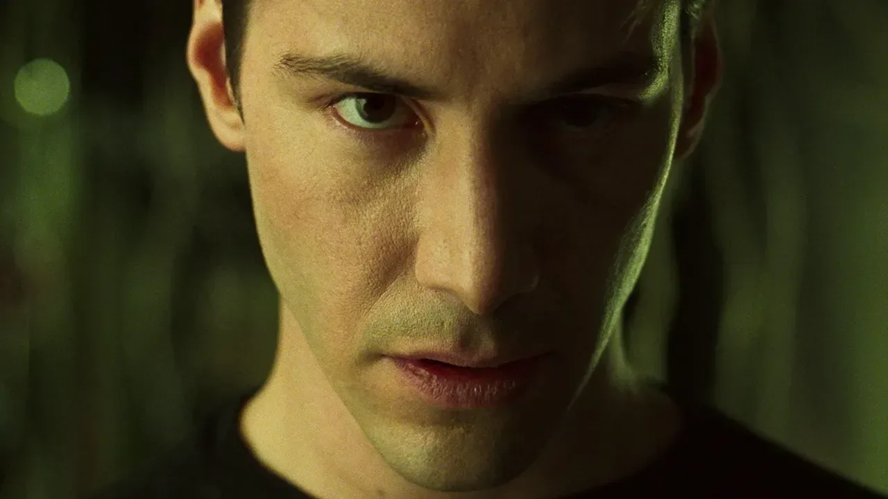 Keanu Reeves and Carrie-Anne Moss as Neo and Trinity in The Matrix