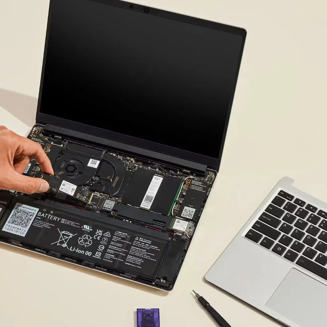 An image from Framework showing a laptop being assembled