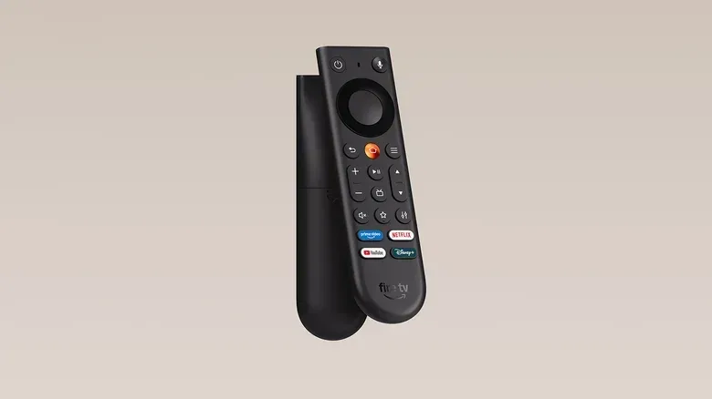 A pair of Fire TV remotes floating in space, with their backs to each other.