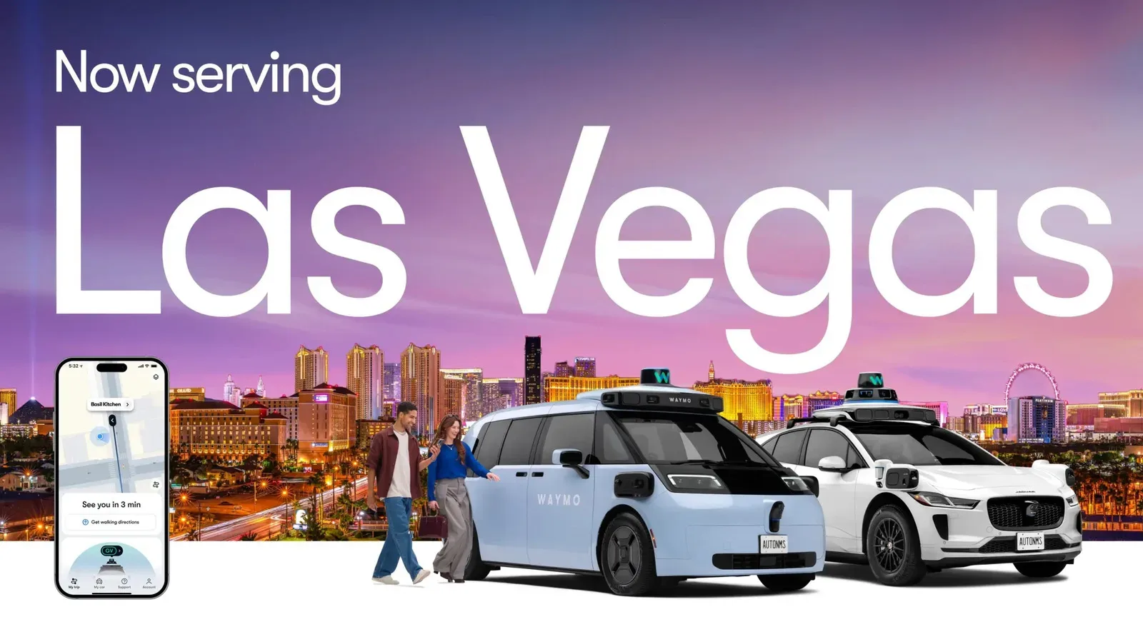 A Waymo Ojai electric robotaxi traveling near the Las Vegas Strip