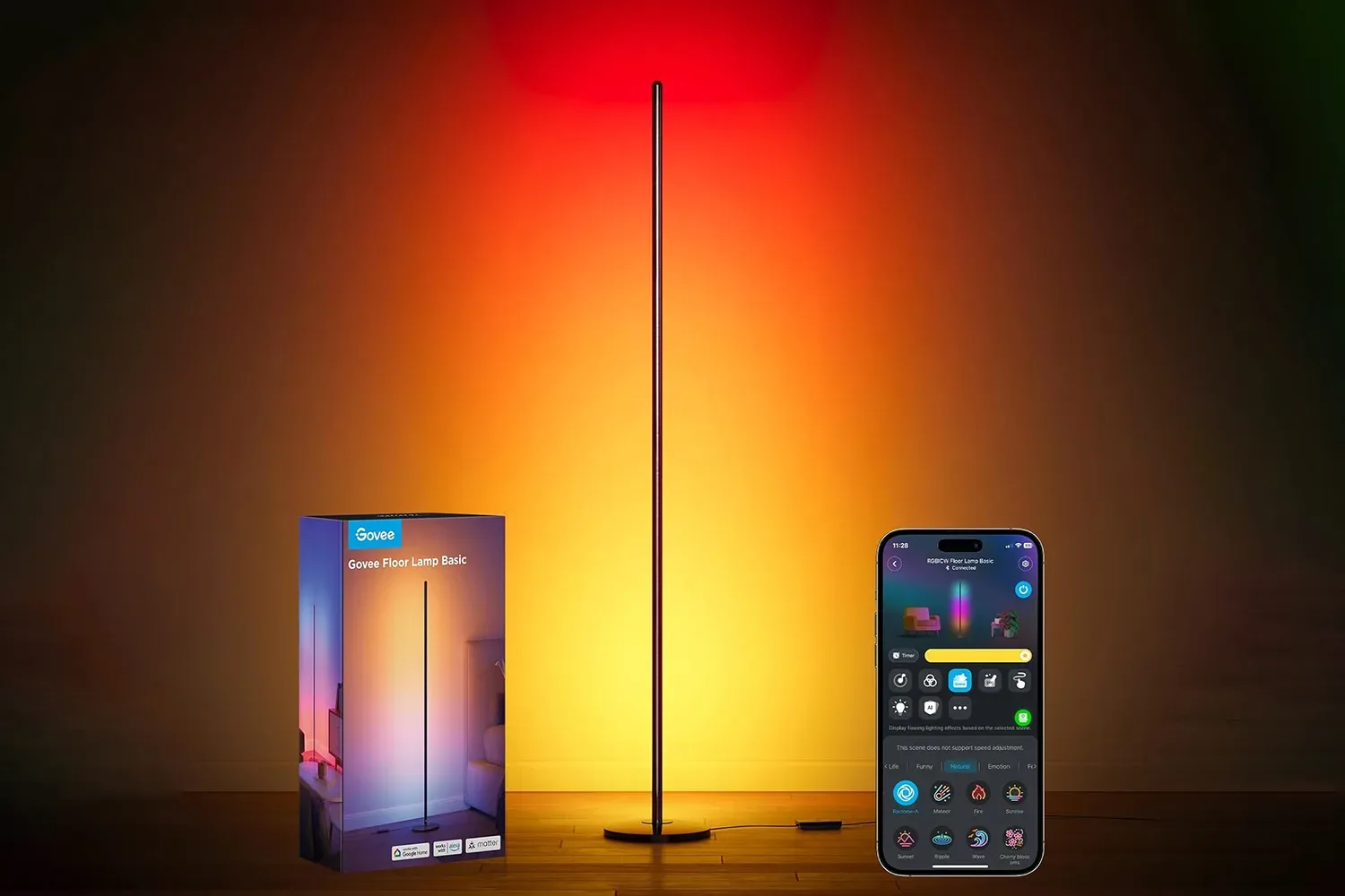 Govee RGBIC Floor Lamp casting multicolor ambient light beside a gaming desk