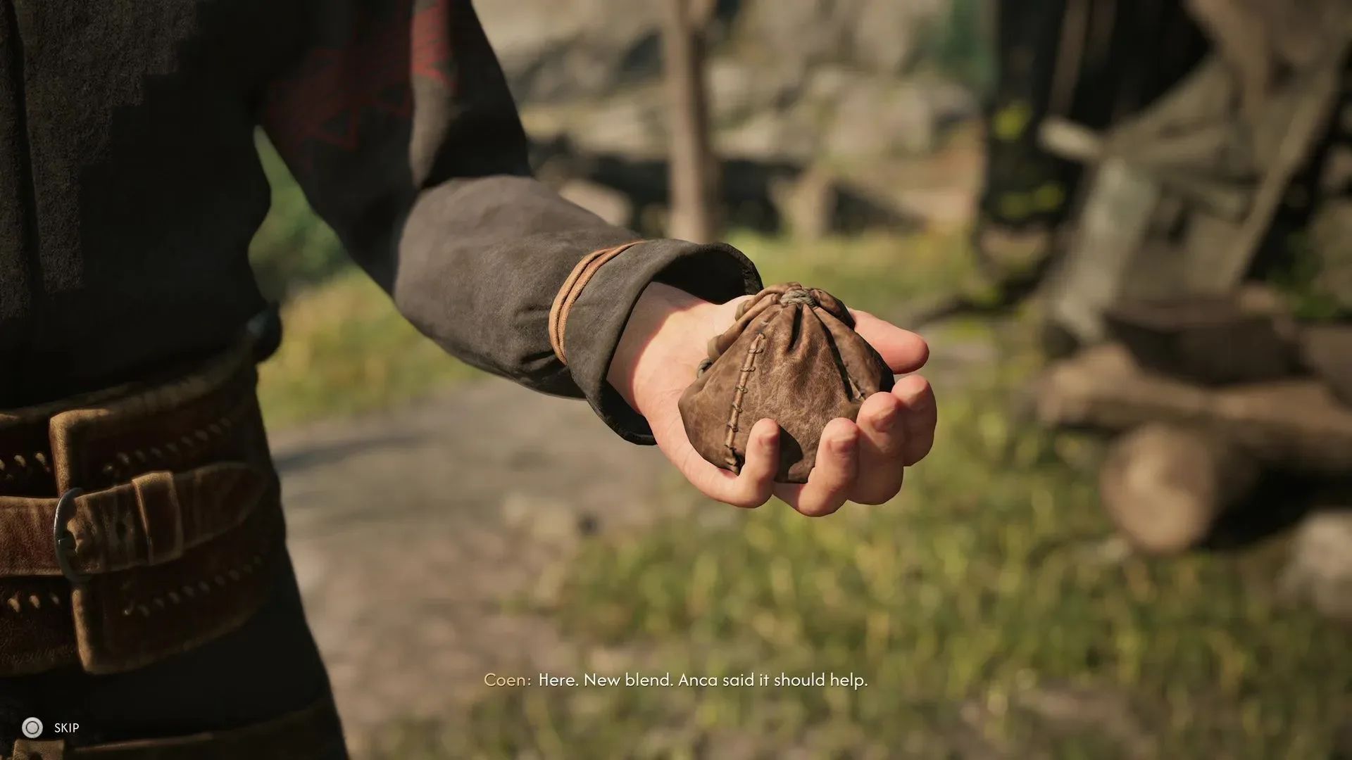 Coen holds up the herbs for brewing in The Blood of Dawnwalker