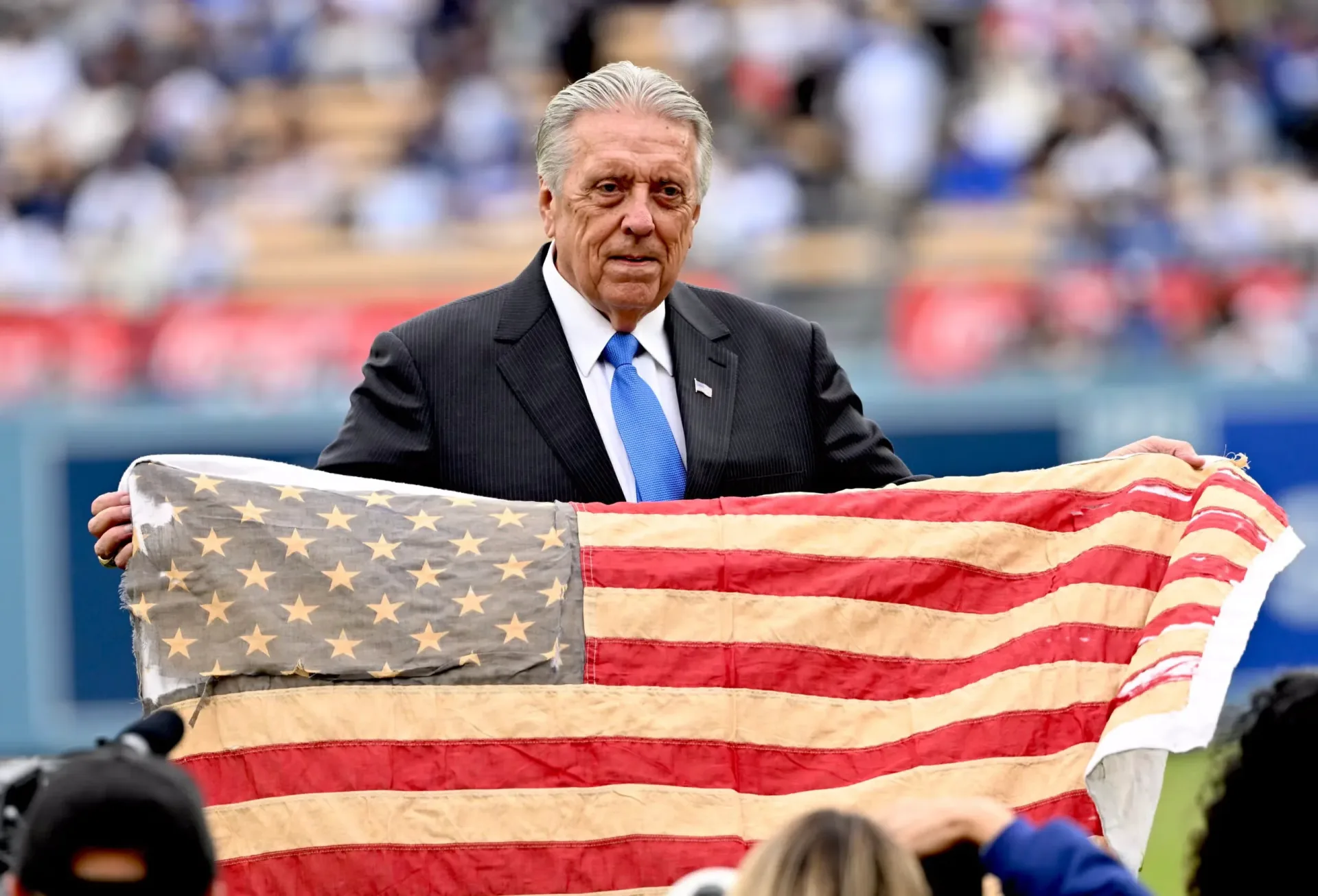 Rick Monday with the American Flag he saved at Dodger Stadium in 1976.