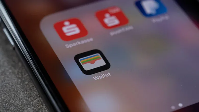 Apple's Wallet app icon in a folder.