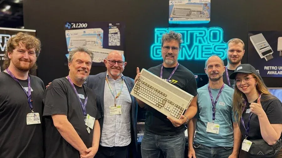 Christian Simpson, Mike Battilana and Retro Games representatives pictured with the upcoming The A1200 at Gamescom