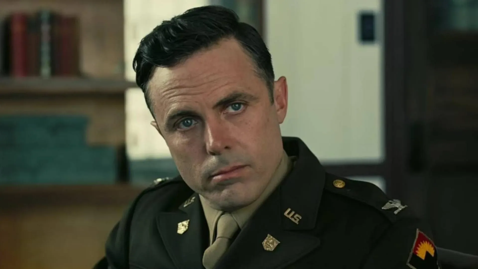 Casey Affleck discussing a Tenet debate involving Christopher Nolan